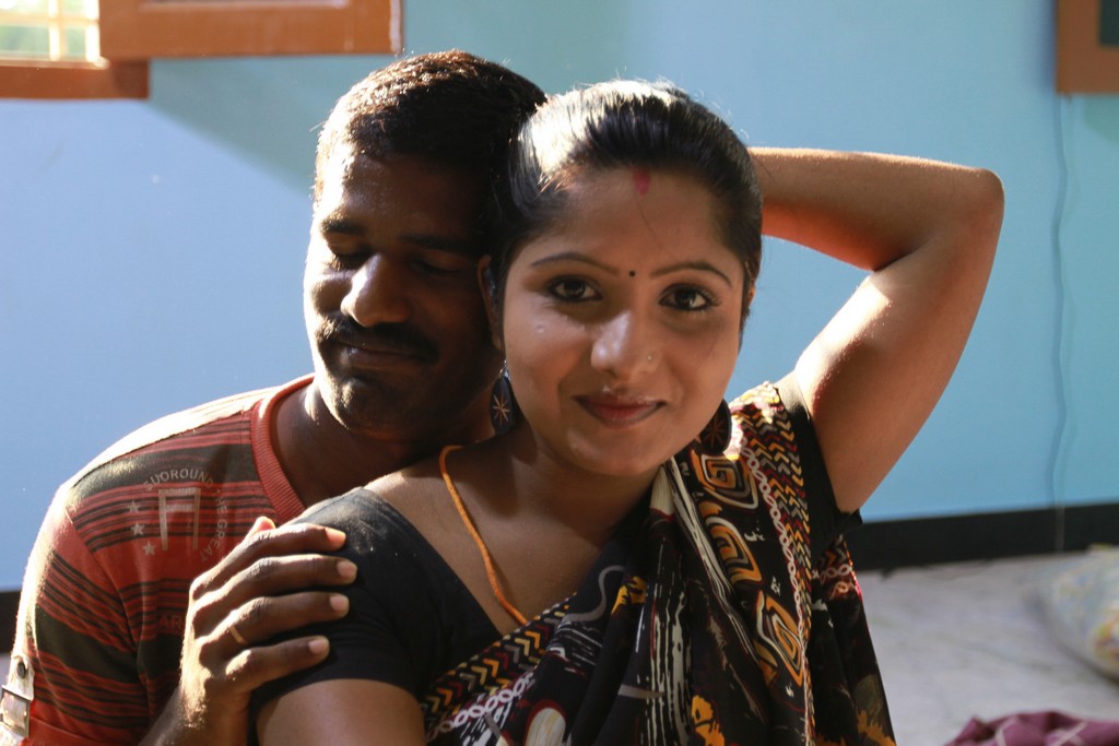 Madhuram Movie Hot Photos